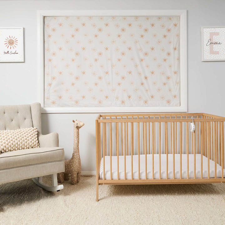 Sunny Smiles suction cup blackout blind with sun print in nursery